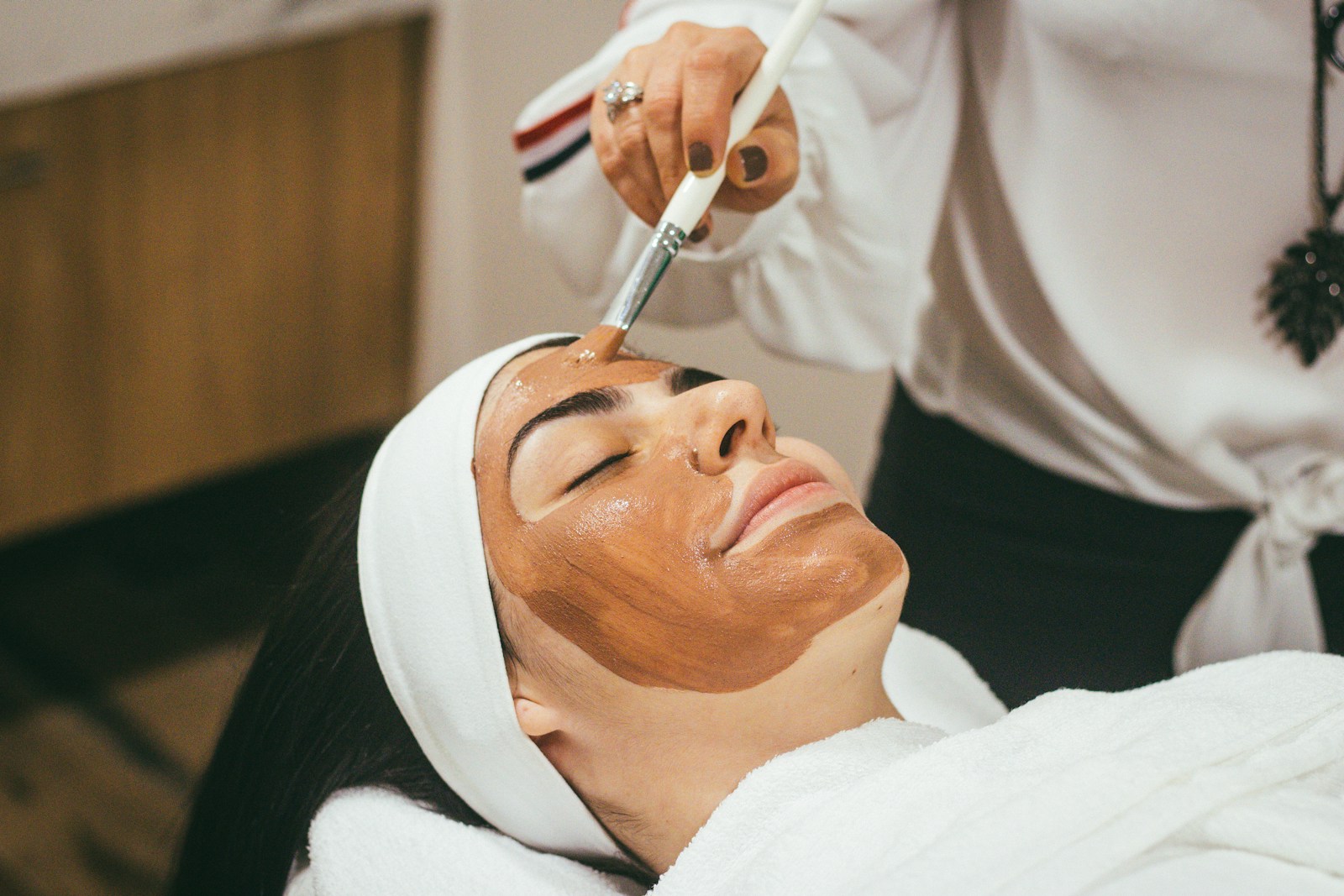 Ansiktsbehandling med maske